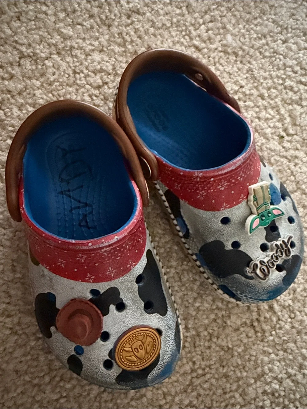 CROCS Kids Cow-Print Clogs with Red Trim and Blue Insole